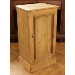 A late 19th / early 20th Century pine bedside cabinet, 31 cm 41 cm x 76 cm