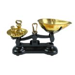 A set of Libra Co traditional brass and iron kitchen scales together with weights, height 20 cm