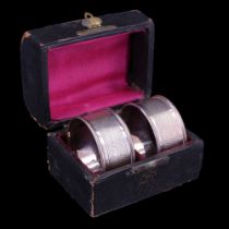 A cased pair of silver napkin rings, Chester 1933, 19 g gross