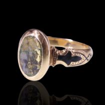 A Victorian gold ore signet ring, comprising an oval polished gold ore matrix (11 mm x 6 mm),