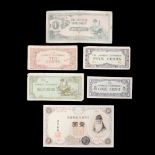 A 1916 Japanese 1 yen Arabic serial banknote together with a group of Second World War military