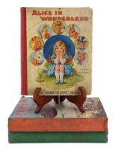 Three vintage children's annuals including Alice in Wonderland, Champion Book for Boys, etc