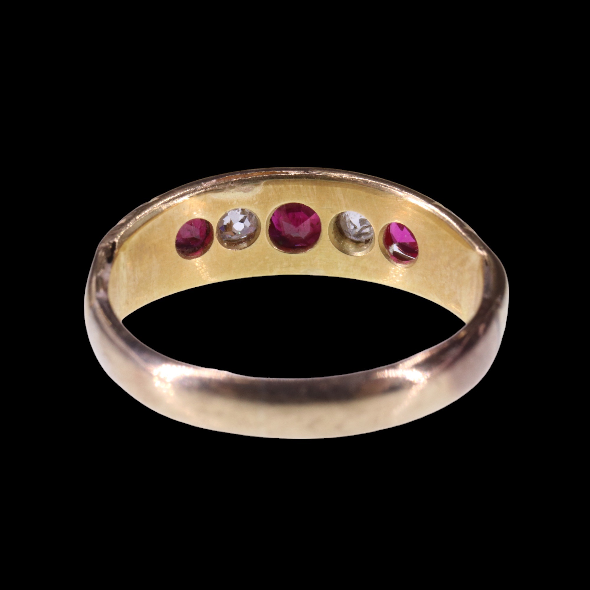 An antique ruby and diamond ring, comprising three round-cut rubies, the central stone of approx 0.3 - Image 3 of 3