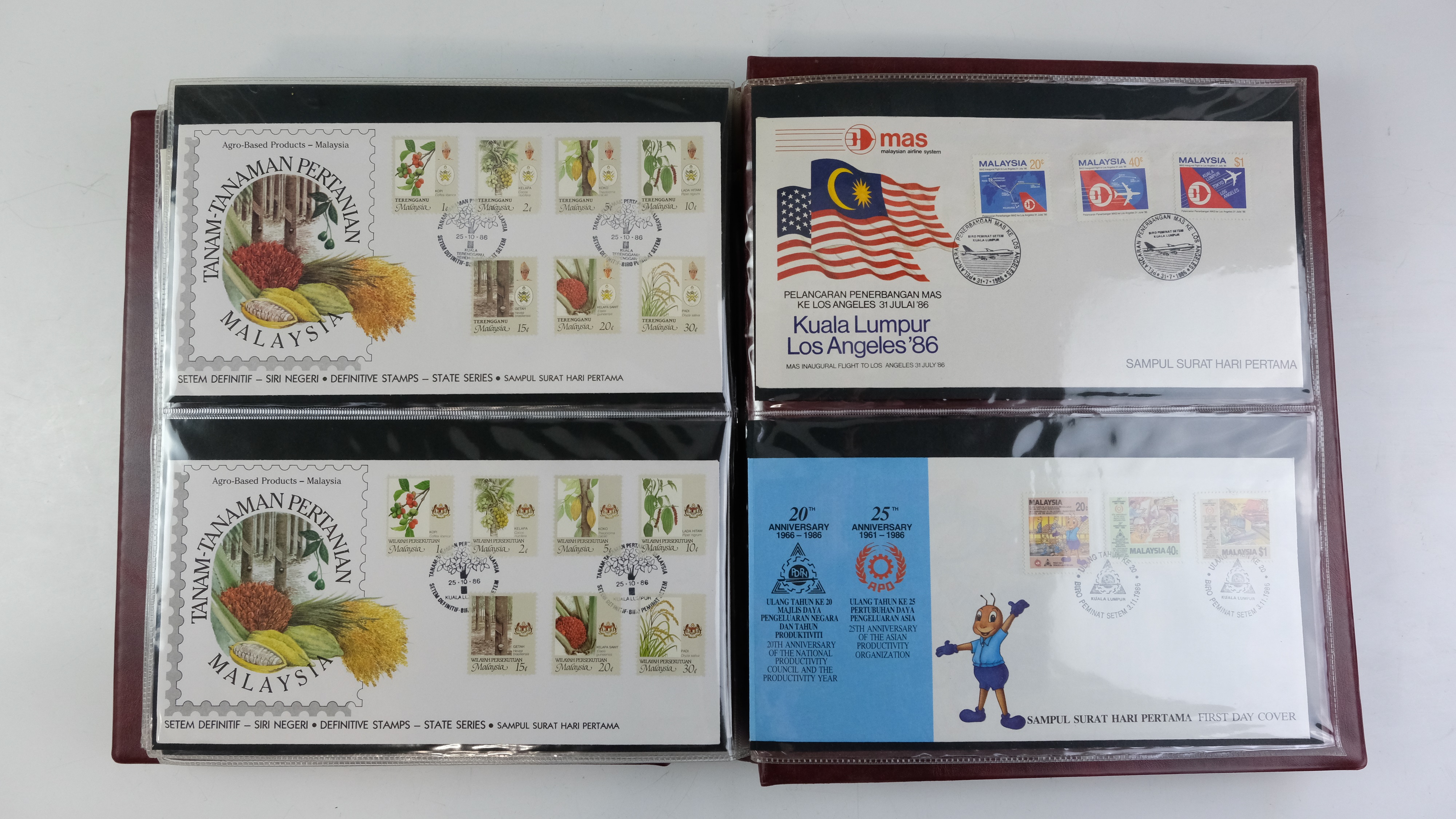 A large quantity of albums containing various world stamp covers including royal commemoratives, - Image 143 of 154