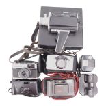 A quantity of film and cine cameras including a 127 mm Kodak Baby Brownie, a 35 mm Olympus Trip