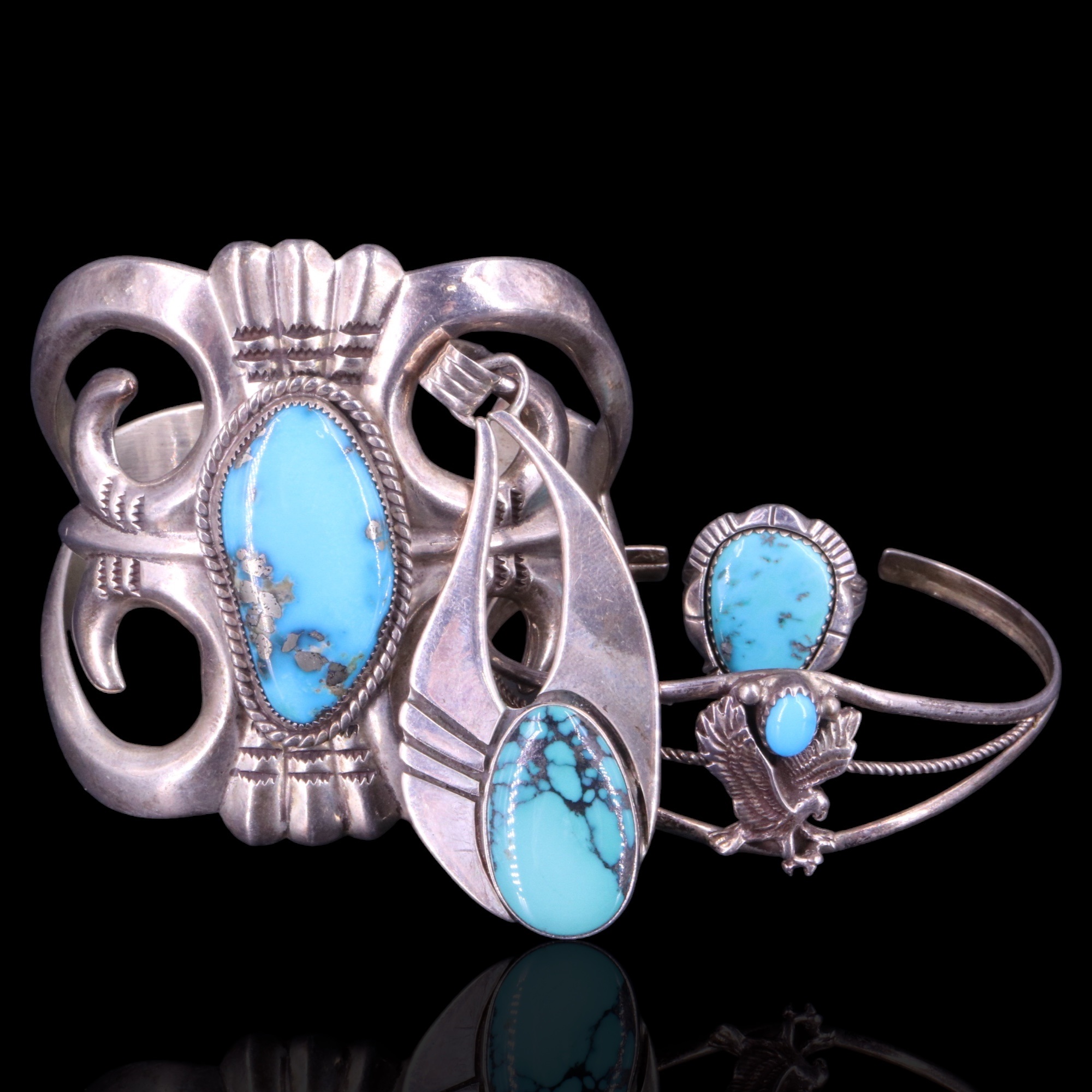 [ Native American ] A Navajo American turquoise and silver cuff bangle by Wilson Begay I, together