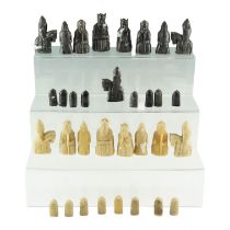A medieval style resin chess set, King's 9 cm