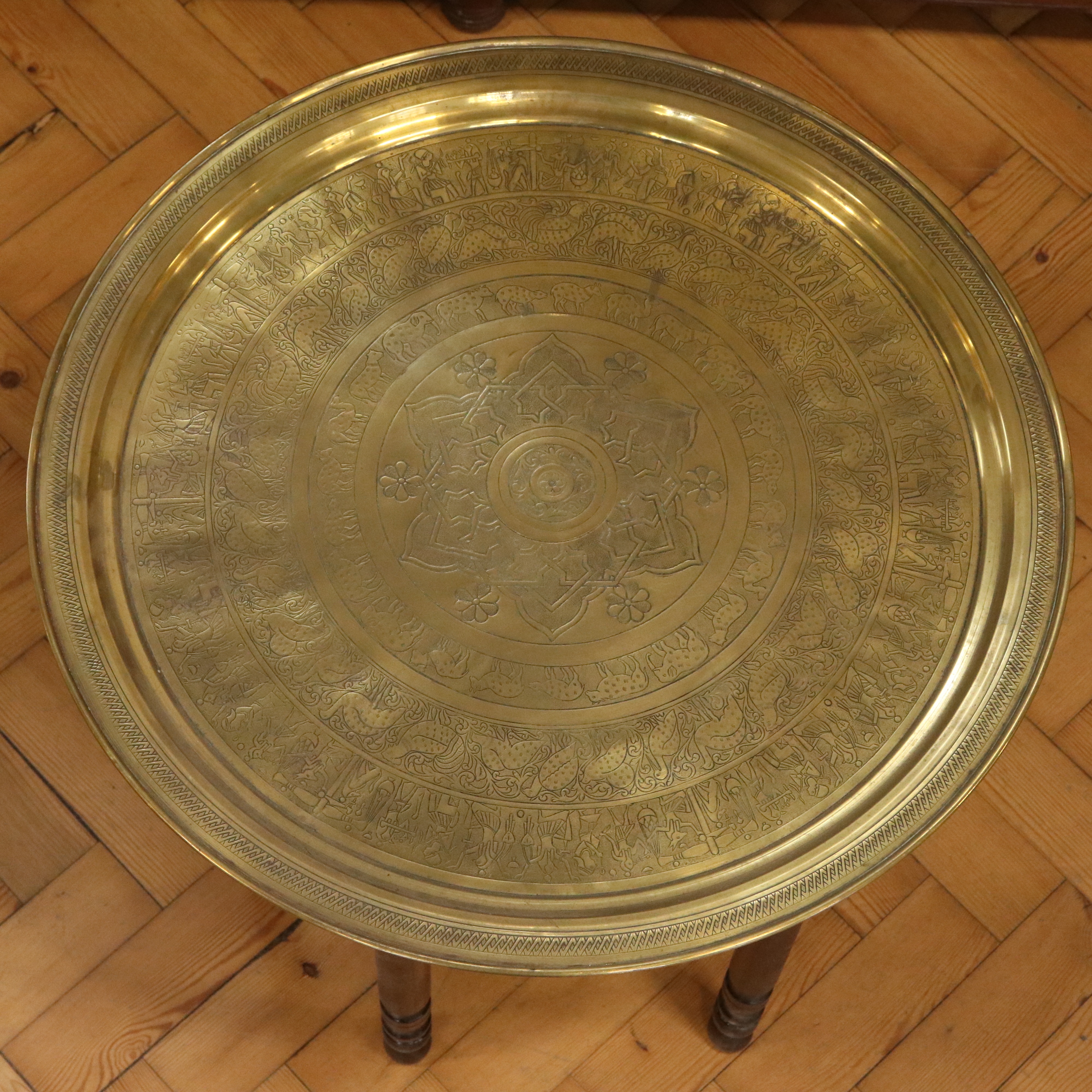 An early-to-mid 20th Century Egyptian brass-topped folding table, 59 cm x 54 cm - Image 2 of 3