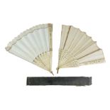 Two late Georgian / early Victorian fans, each having decorative bone guards and sticks, one
