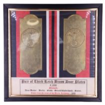 A pair of German Third Reich type brass door plates, framed under glass, 41 cm x 41 cm overall, (not