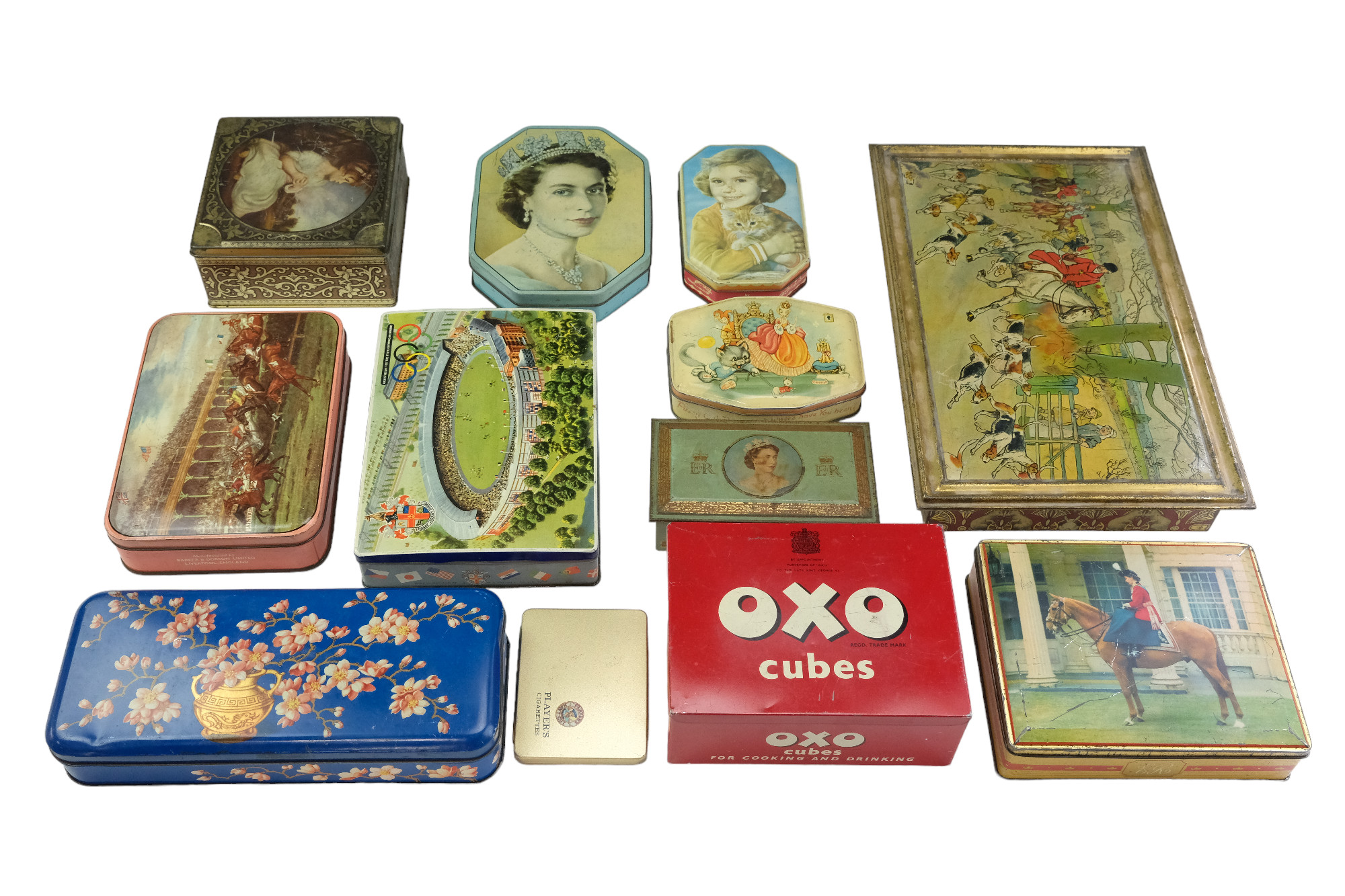 A collection of vintage printed tinplate boxes including a large 1920s Huntley and Palmer biscuits