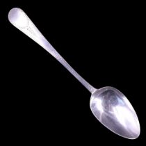 A George III silver Hanoverian pattern tablespoon, bearing bright cut engraved decoration, George