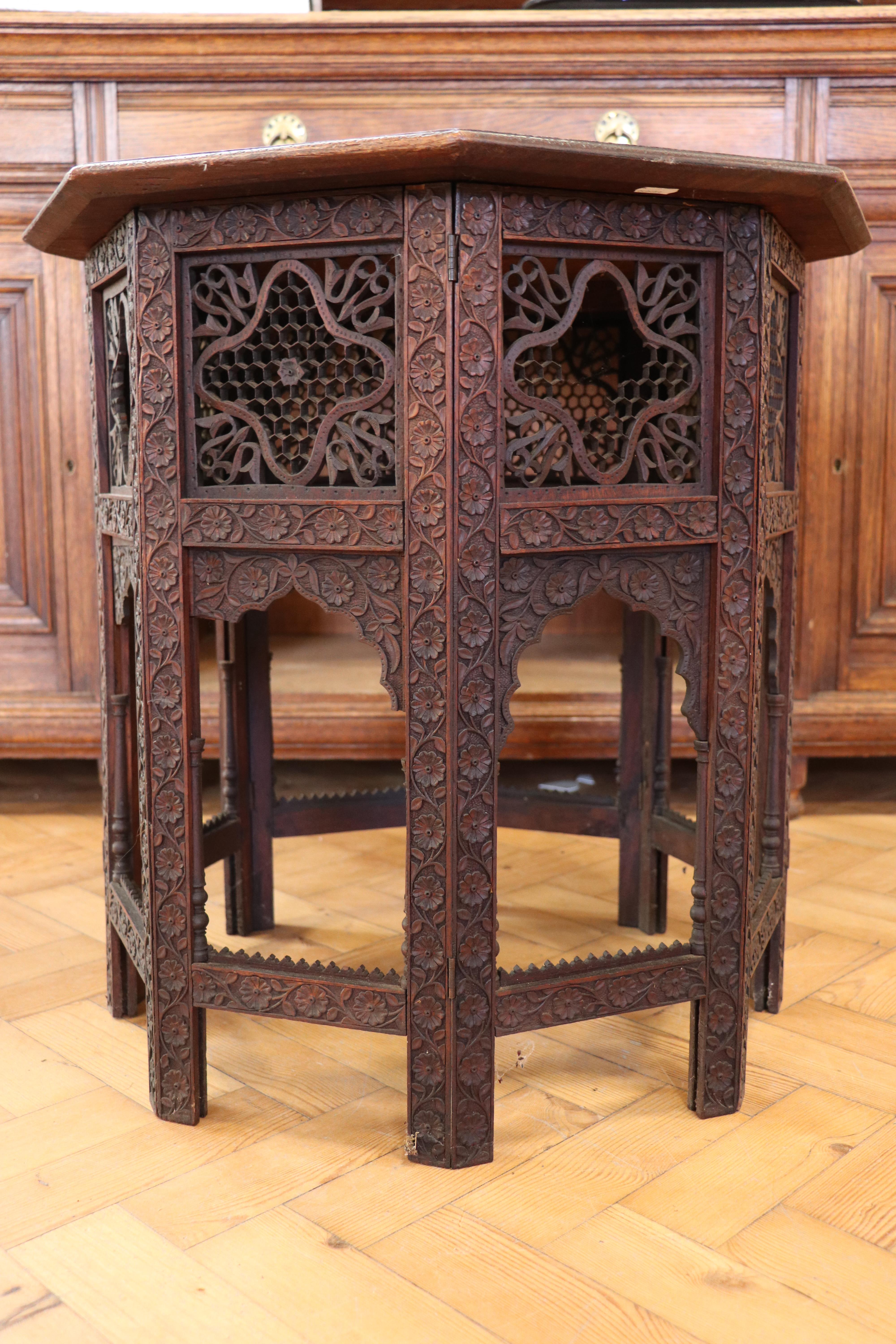 An early 20th Century Indian Hoshiarpur carved wooden folding table, 61 cm x 63 cm high - Image 3 of 7