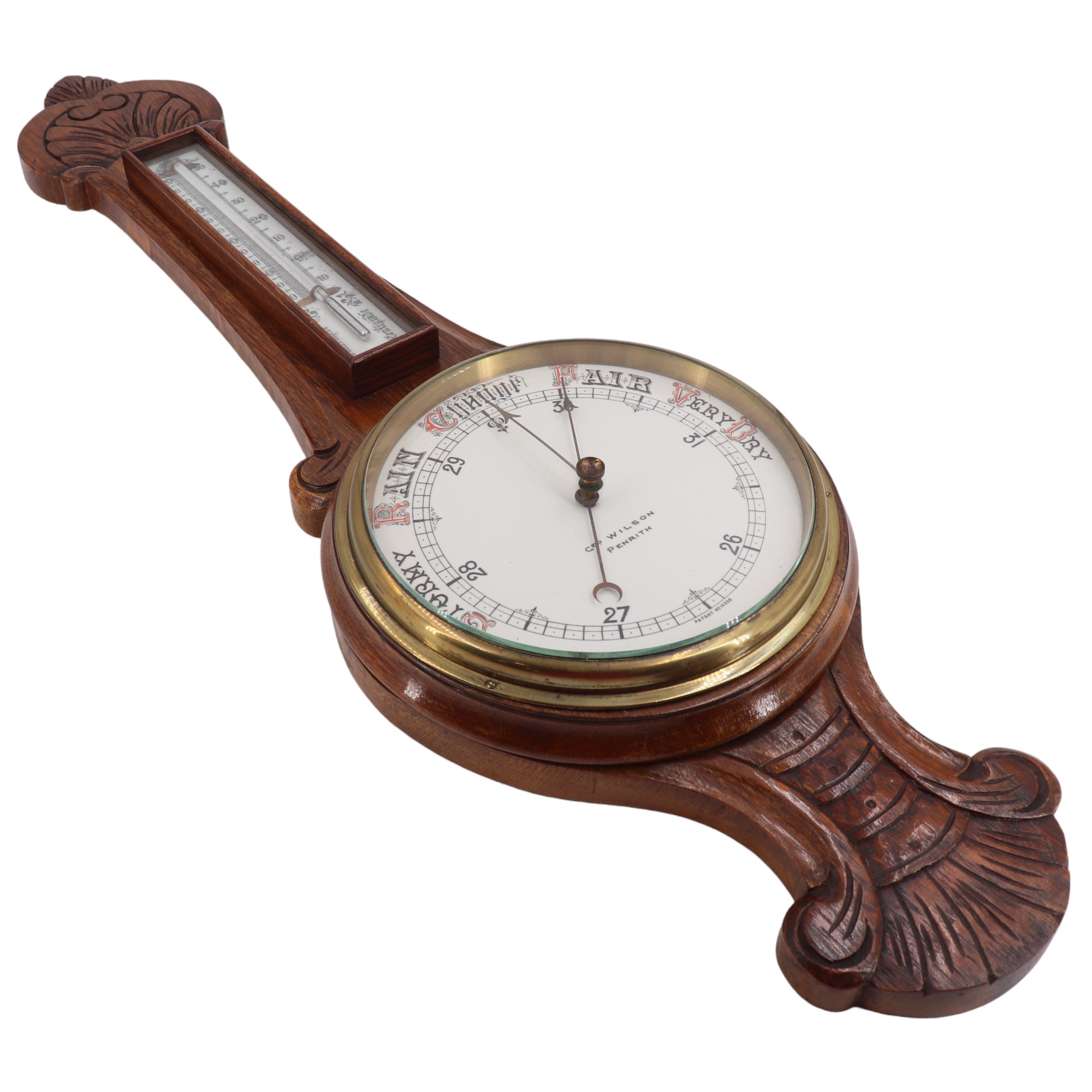 A late 19th / early 20th Century carved oak banjo barometer by Geo Wilson of Penrith, 84 cm
