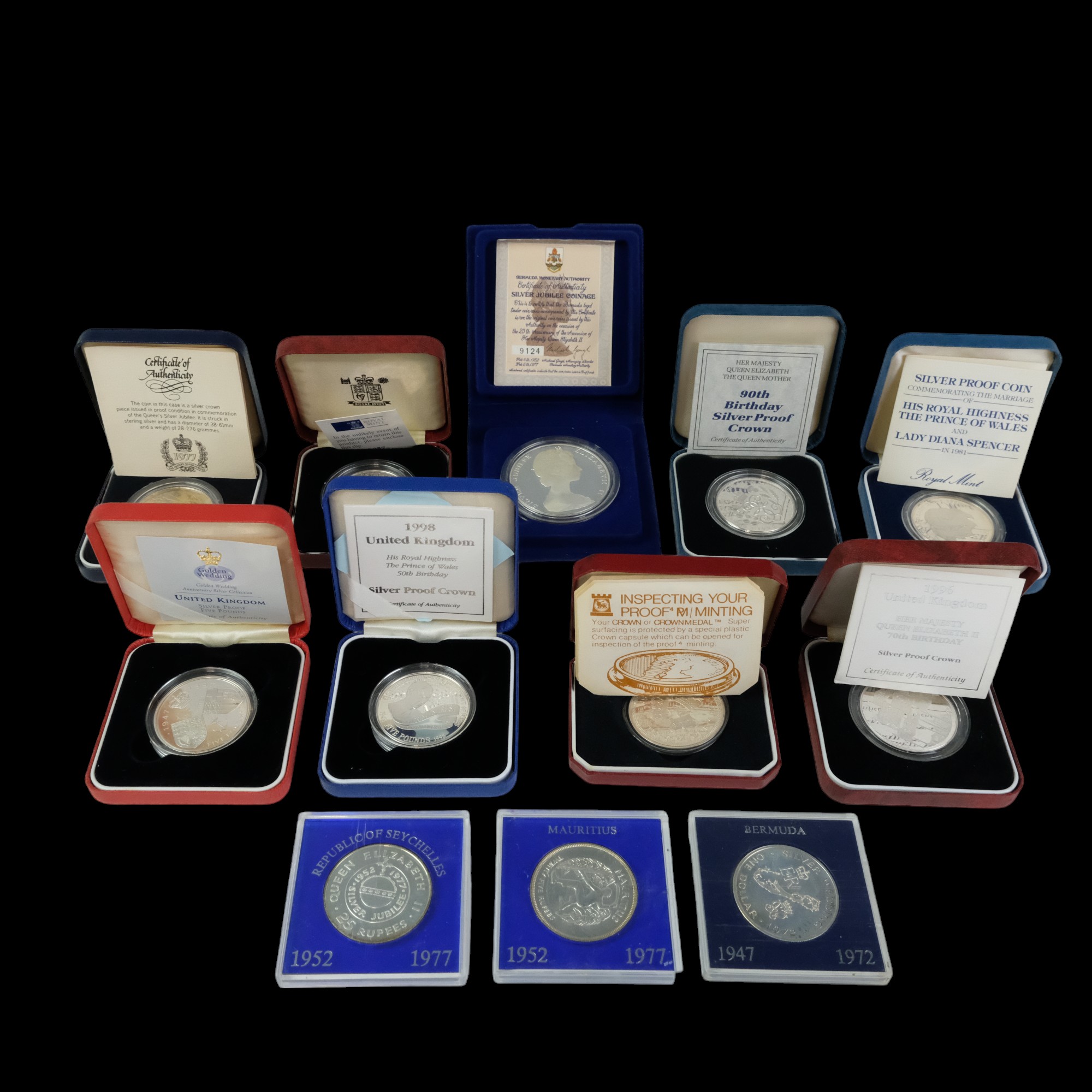A group of silver proof royal commemorative coins including a 1996 70th Birthday crown, 1981 royal