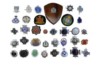 A group of 20th Century Ambulance Service badges together with Scottish Constabulary, National