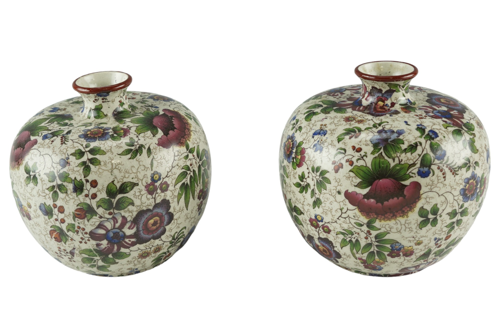 A pair of early 20th Century transfer-printed and floral decorated, shouldered oviform vases, 12 cm