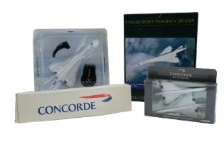 A British Airways Concorde model kit together with diecast Corgi and delPrado model aeroplanes and a