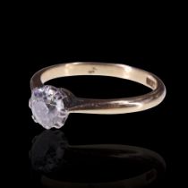 A vintage 0.5 ct diamond solitaire ring, the brilliant platinum-claw-set on an 18 ct gold shank, 2.8