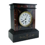 A Victorian parcel-gilt polished slate and red marble mantle clock having a single train movement,