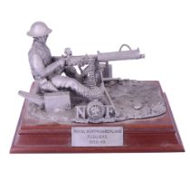 A "Royal Northumberland Fusiliers 1939-45" diecast figurine of a soldier with a Vickers Machine Gun,