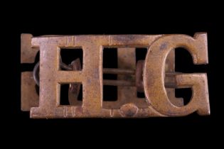 A pair of Home Guard brass shoulder titles