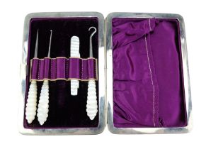 A cased mother-of-pearl handled dressing and sewing accoutrements set, late 19th / early 20th