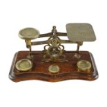 A set of Victorian letter scales with weights, 16.5 cm