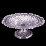 A Victorian silver bon-bon dish having a gadrooned foot and body with a floral rim, Sibray, Hall &