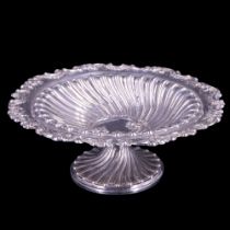 A Victorian silver bon-bon dish having a gadrooned foot and body with a floral rim, Sibray, Hall &
