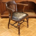 A late 19th / early 20th Century oak office armchair