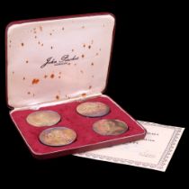 A cased set of four The Churchill Medals in "24 ct Gold on Sterling Silver" by John Pinches Ltd,