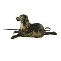 A late 19th / early 20th Century French Tantet & Manon tinplate dog toy with a crémaillère