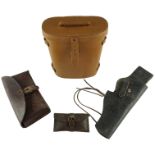A British military binoculars case together with a holster, pouch and gun cleaning kit