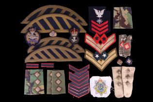 Sundry items of world military cloth insignia etch