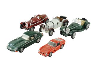 Five Bburago diecast model cars including a Jaguar SS100, Jaguar E-Type 1961, etc, 1:18 scale