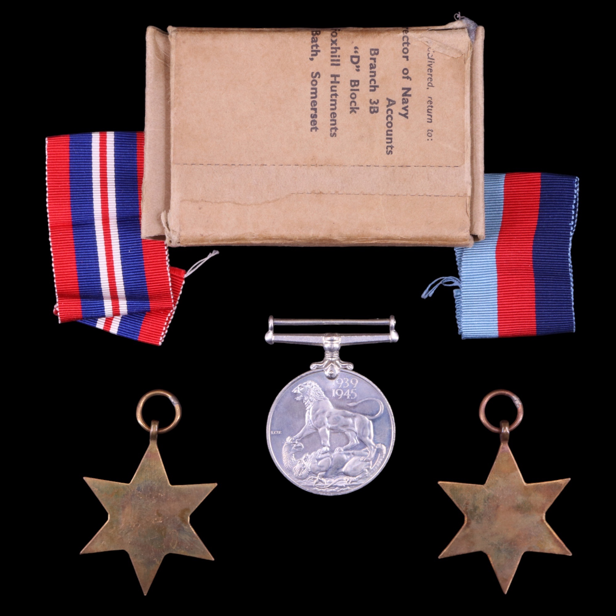 A group of Second World War campaign medals in carton awarded by the Admiralty to Mr R Whiteside - Image 2 of 2
