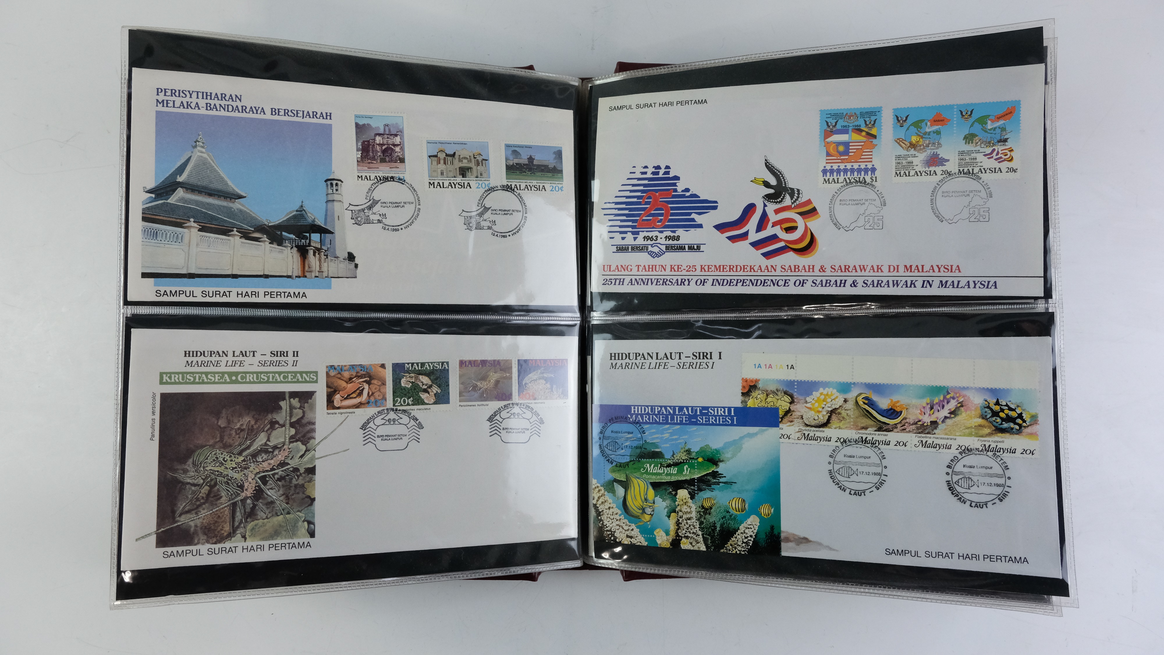 A large quantity of albums containing various world stamp covers including royal commemoratives, - Image 137 of 154