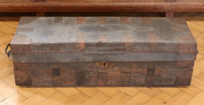A late Georgian / early Victorian campaign or travel trunk, in hide-covered wood with brass and iron
