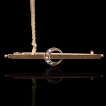 An antique seed-pearl-set 9ct gold crescent bar brooch, early 20th Century, 43 mm, 1.4 g