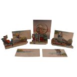 A small group of Japanese printed novelty folding / standing cards depicting figures travelling by