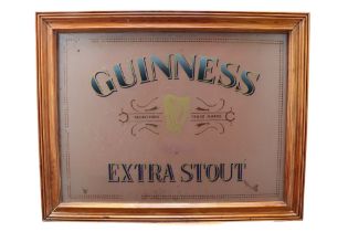 A Guinness advertising mirror, 70 cm x 55 cm