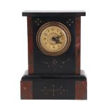 A German gilt-enriched, polished black slate and red marble mantle clock of diminutive stature,