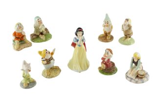 Eight Royal Doulton Snow White and the Seven Dwarfs boxed figurines together with a similar boxed