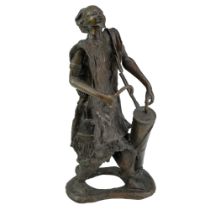 Dermé Morou (Ugandan, 1940-2000) A bronze statue of a male musician beating a drum, lost wax cast