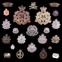 A collection of Border Regiment and related badges
