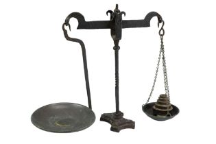 A Victorian iron beam scales and weights, 40 cm high