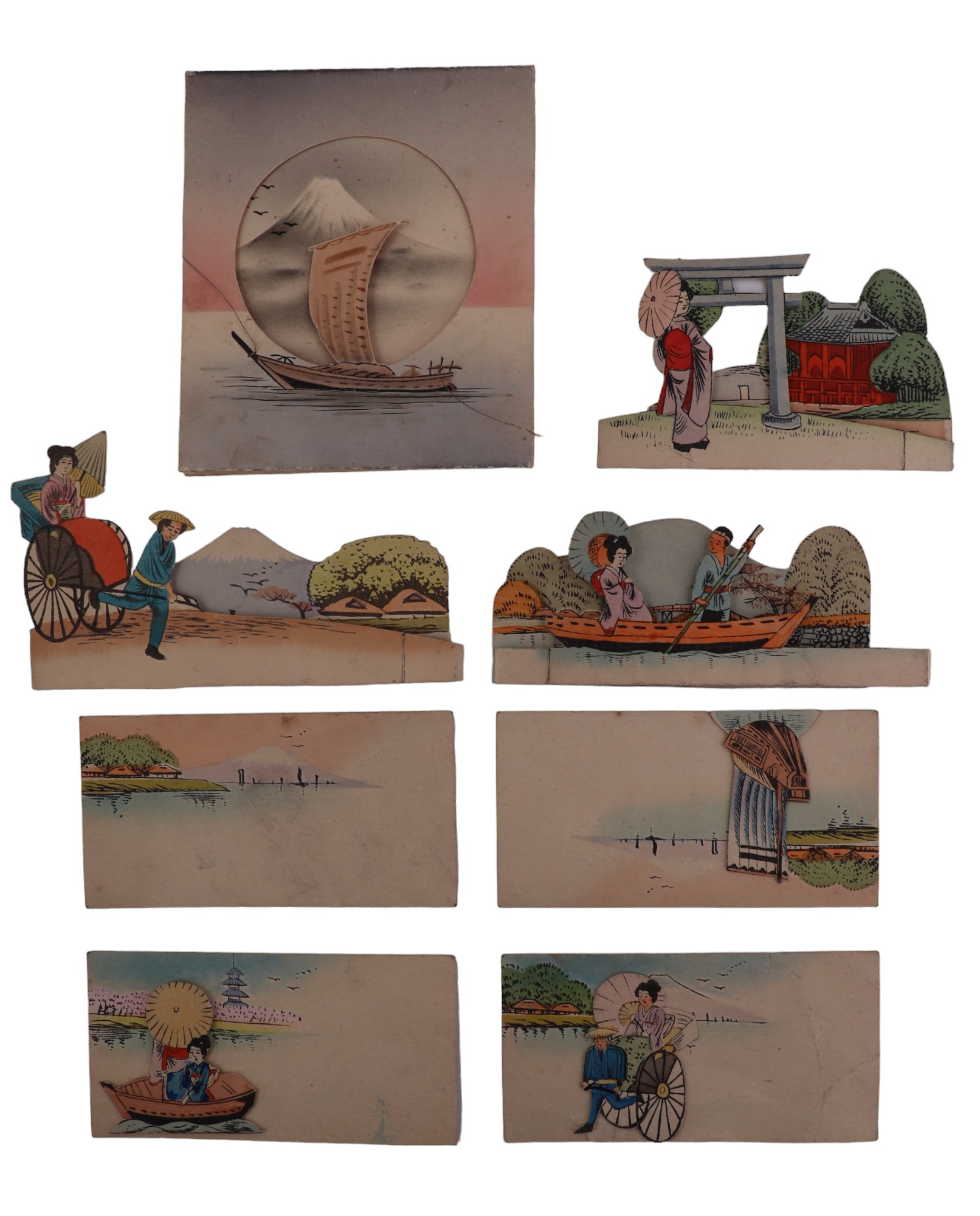 A small group of Japanese printed novelty folding / standing cards depicting figures travelling by - Image 2 of 3