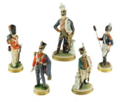 Five late 20th Century Rudolf Kämmer of Volkstedt hand-painted porcelain military figurines