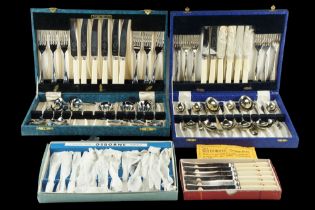 An Osborne of Sheffield boxed cutlery set together with two other cased cutlery sets and boxed